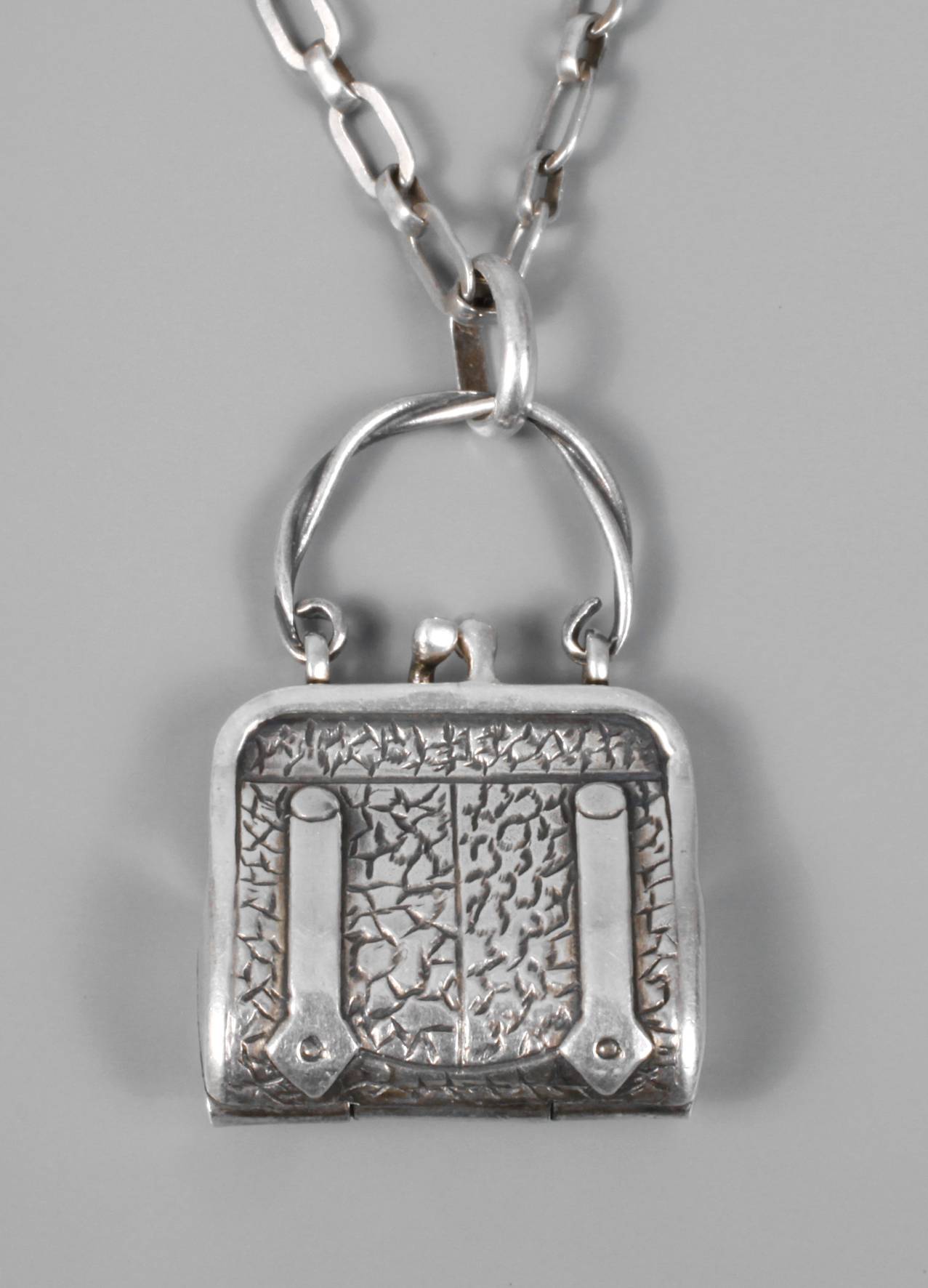 Anhänger als Handtasche