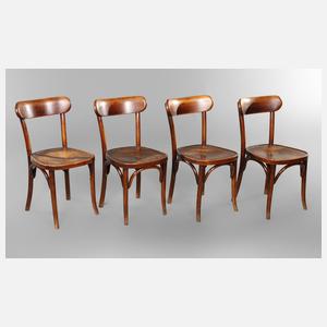 Vier kleine Stühle