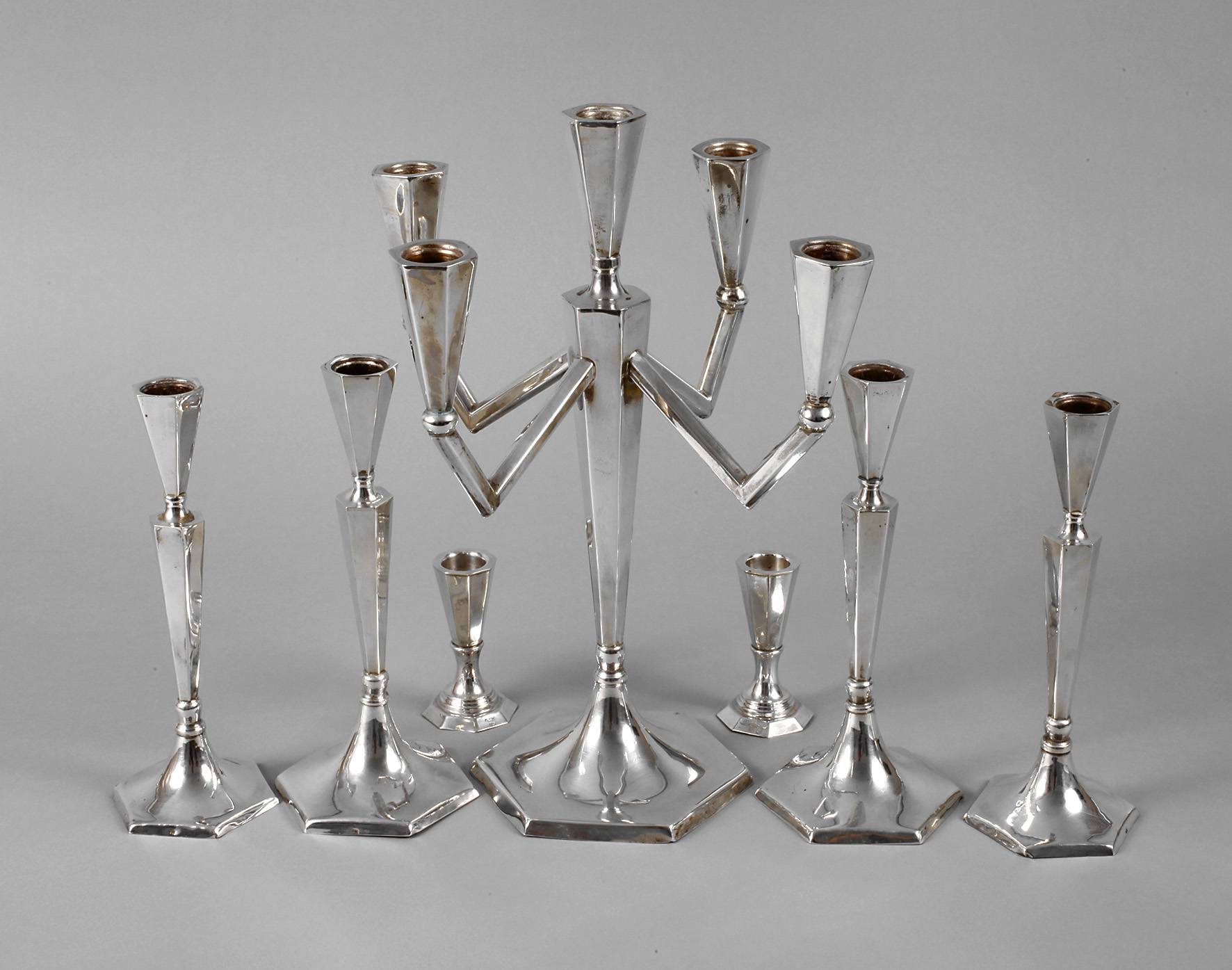 Sieben Silberleuchter Art déco