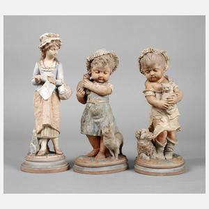 Drei Kinderfiguren