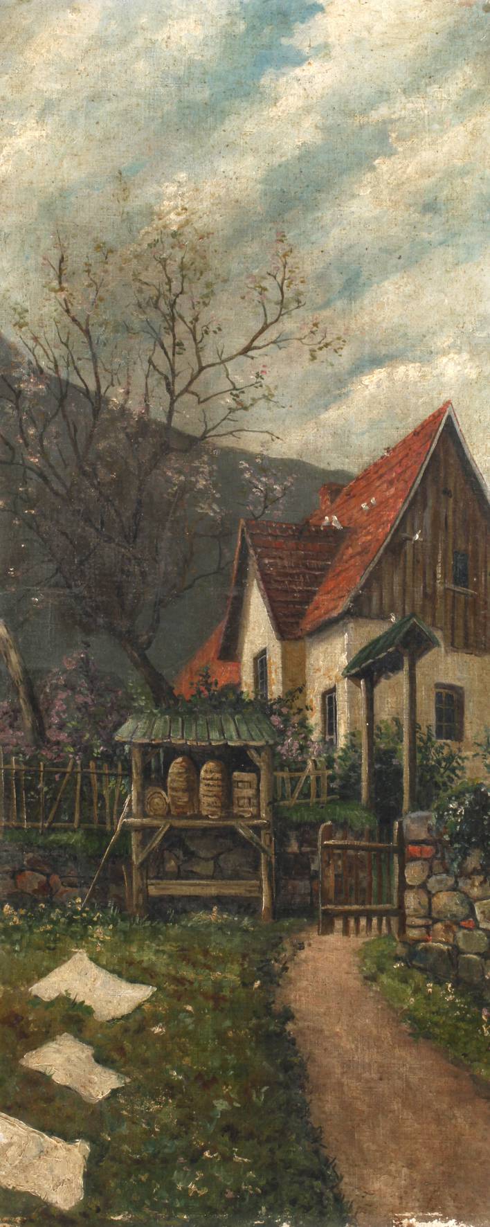 Bauernhaus mit Bienenstöcken