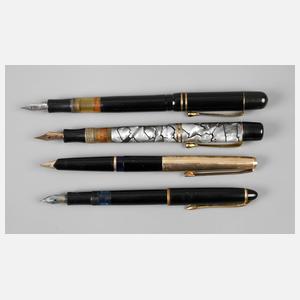 Vier Füllfederhalter