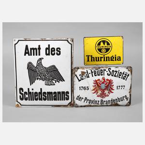 Drei Emailschilder