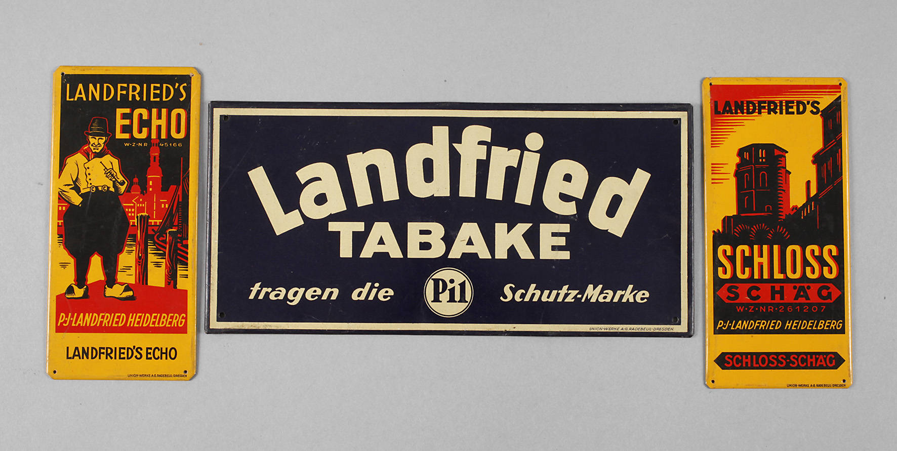Drei Werbeschilder Landfried