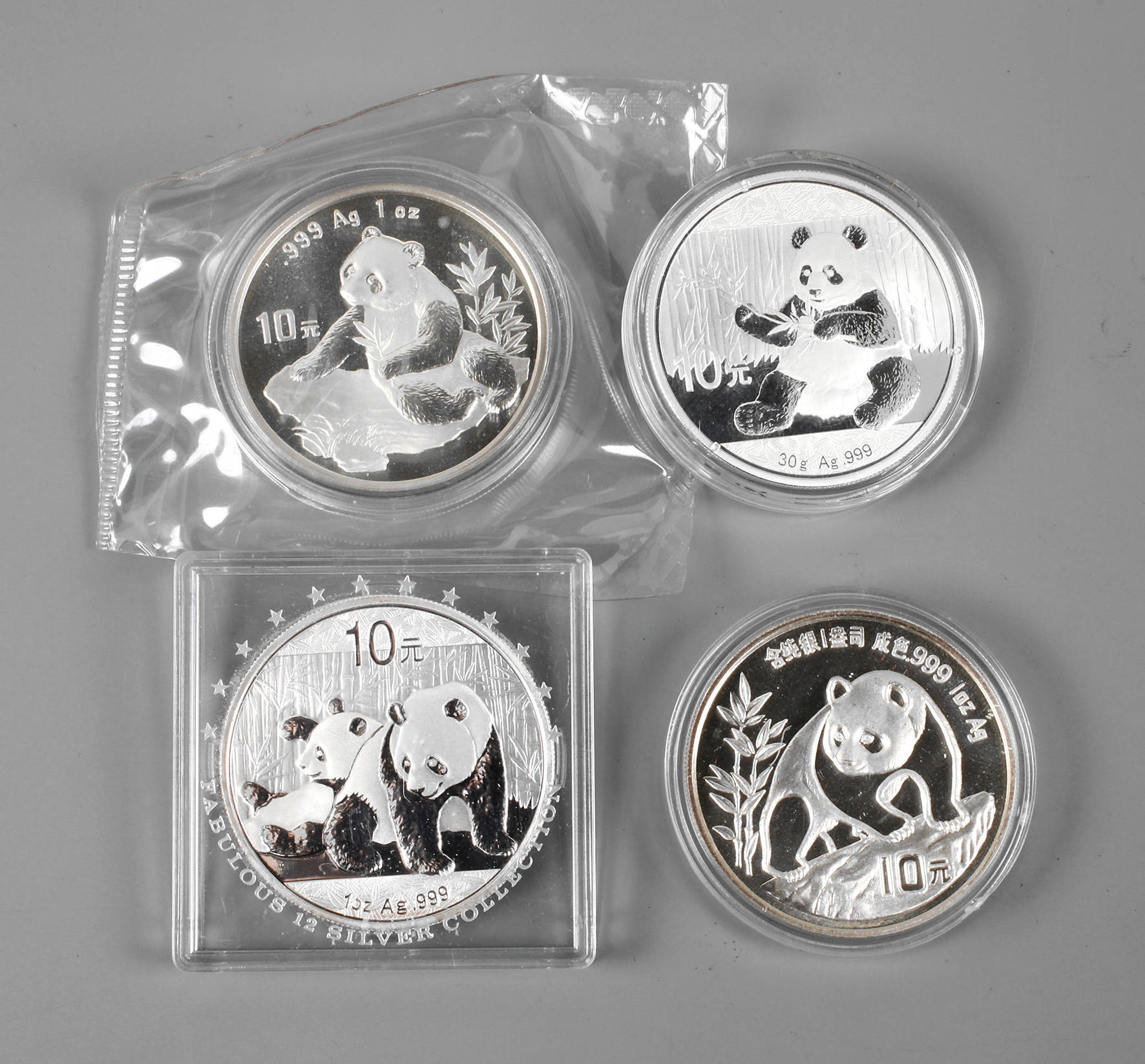 Viermal 10 Yuan Pandas