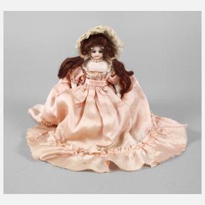 Kleine Porzellankopfpuppe