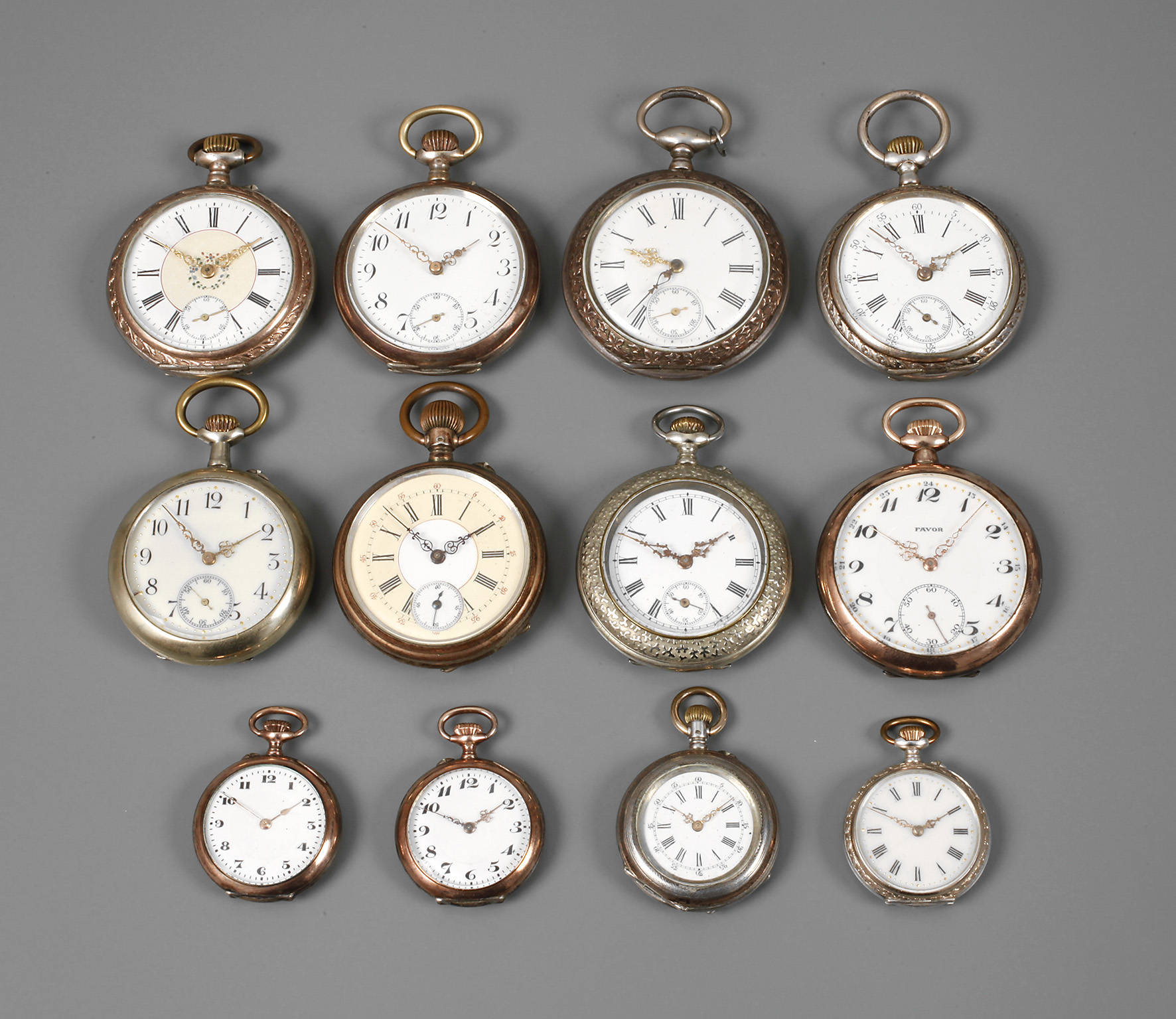 Zwölf Taschenuhren