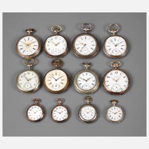 Zwölf Taschenuhren