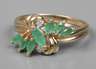 Damenring mit Smaragden und Diamanten