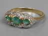 Damenring mit Smaragden und Diamanten