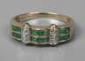 Damenring mit Smaragden und Diamanten