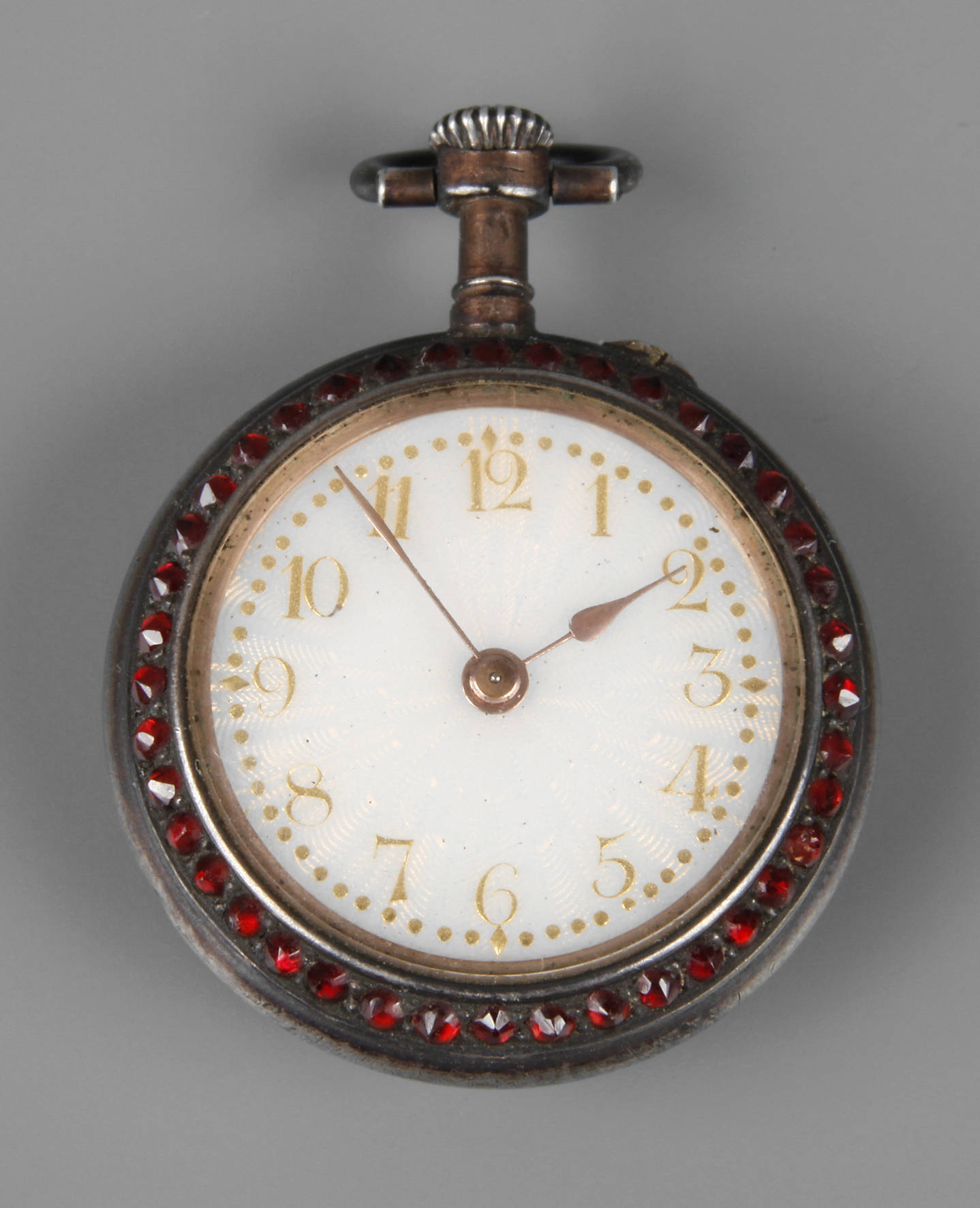 Damentaschenuhr mit Granatbesatz