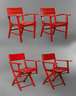 Vier Gartenstühle