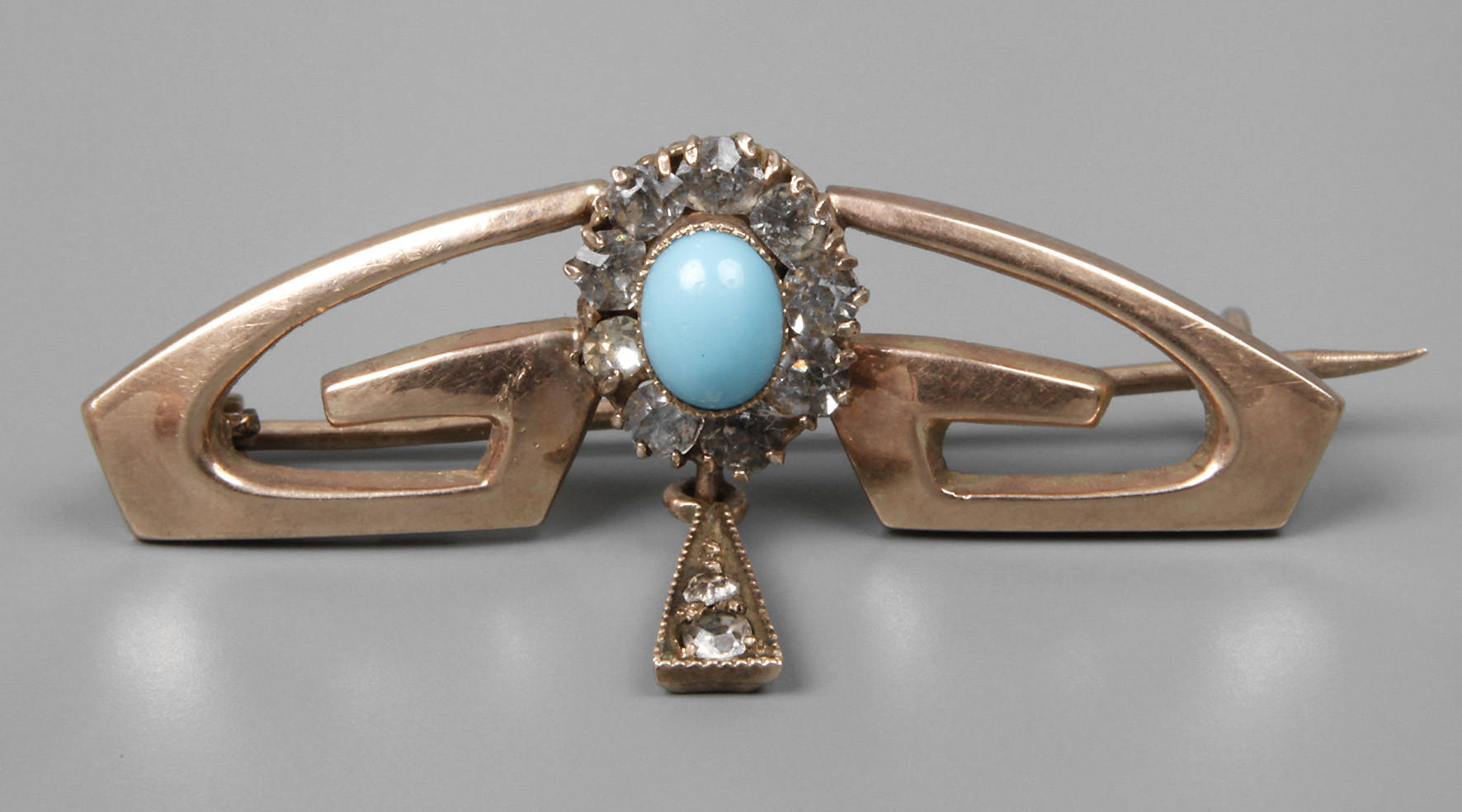 Brosche mit Türkis