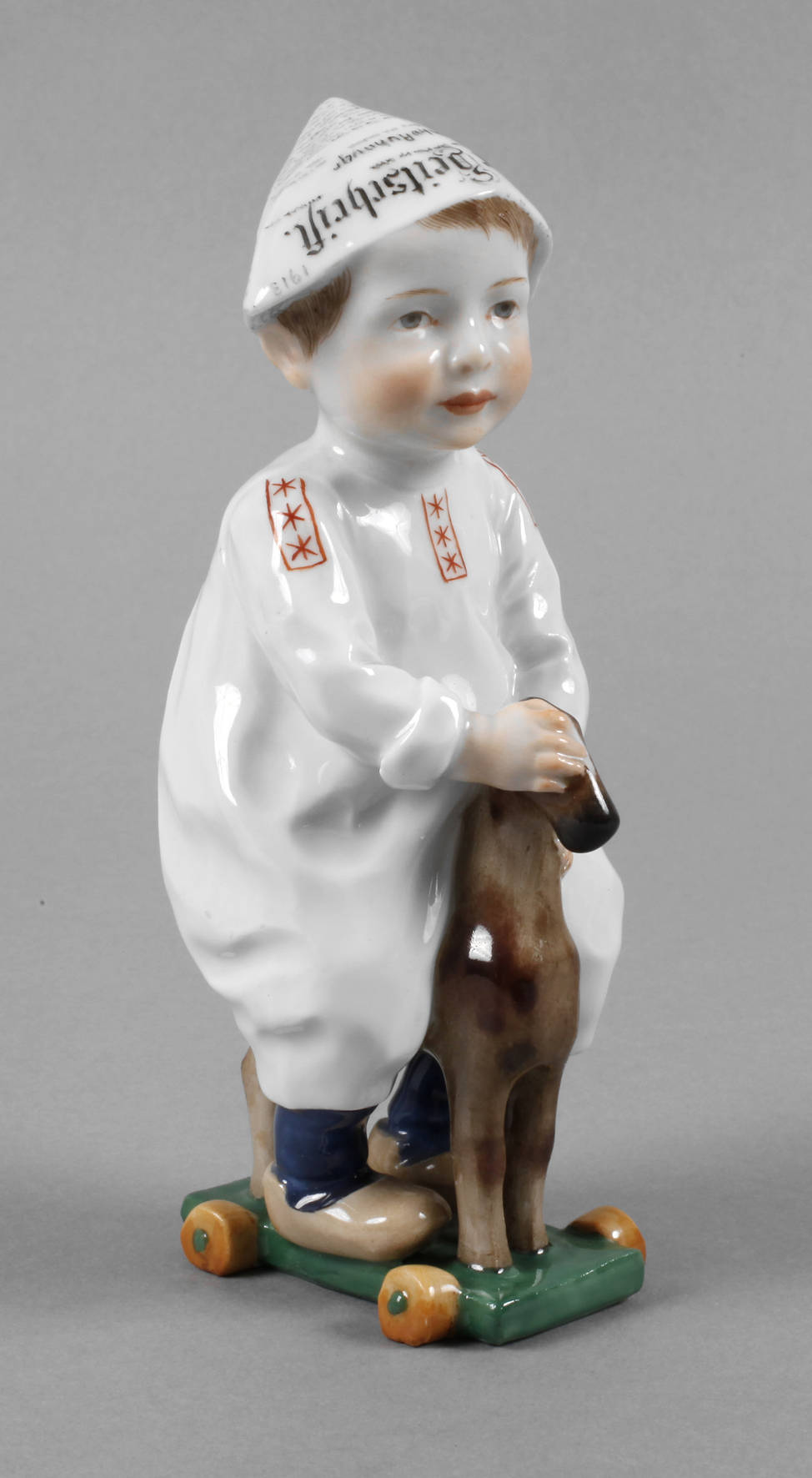 Meissen ”Kind, auf einem Holzpferd reitend”