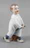 Meissen ”Kind, auf einem Stecken reitend”