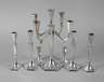 Sieben Silberleuchter Art Déco