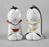 Paar figürliche Teesiebe