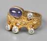Damenring mit Brillanten und Tansanitcabochon