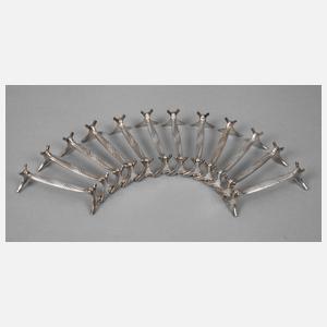 Christofle & Cie. zwölf Messerbänkchen Art déco