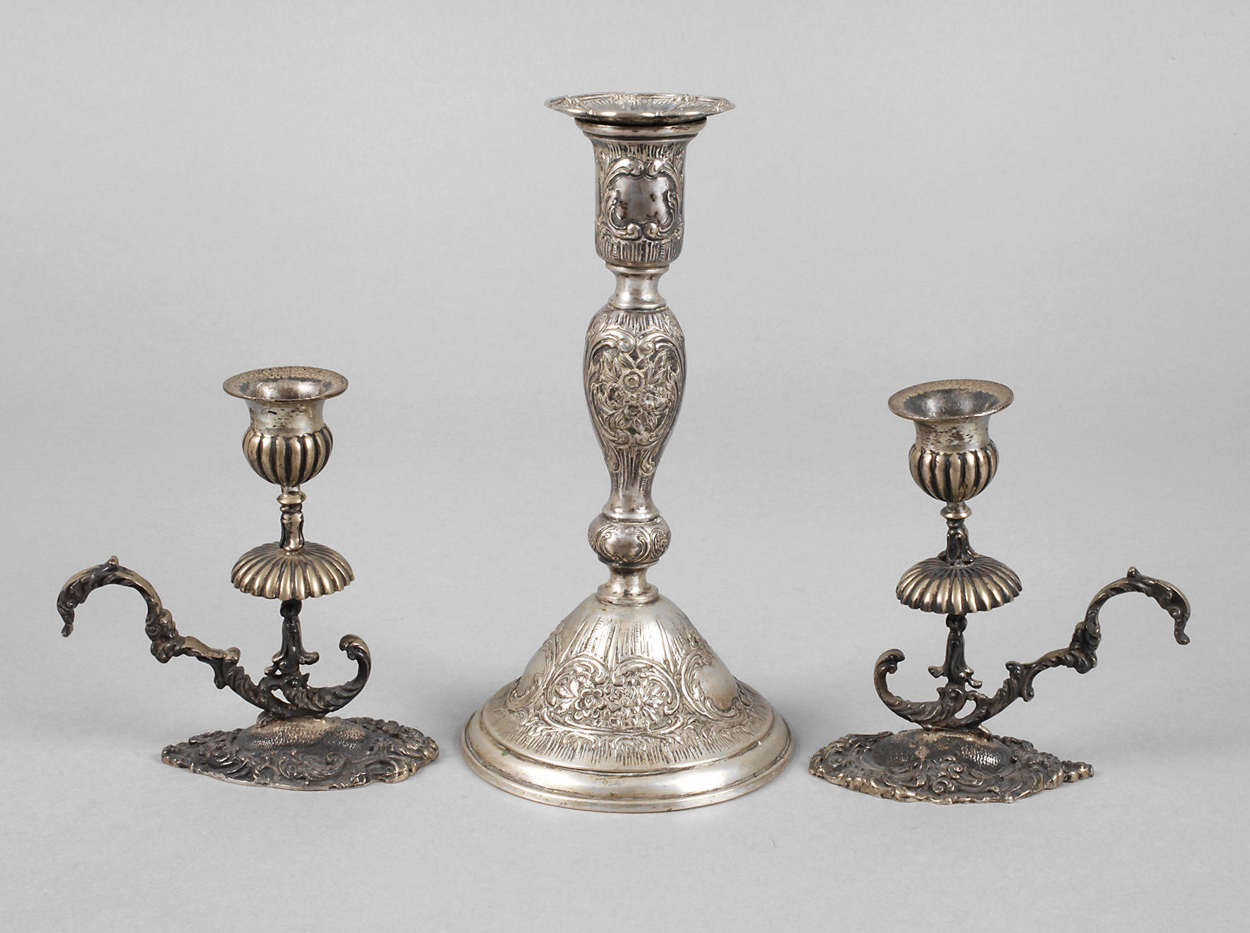 Drei einflammige Leuchter