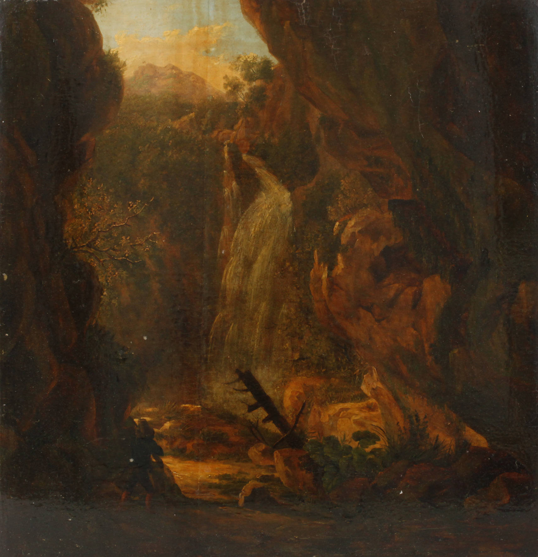 Tiroler Wildschütz am Wasserfall im Gebirge