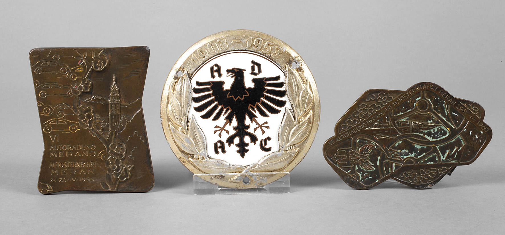Drei Plaketten Motorsport