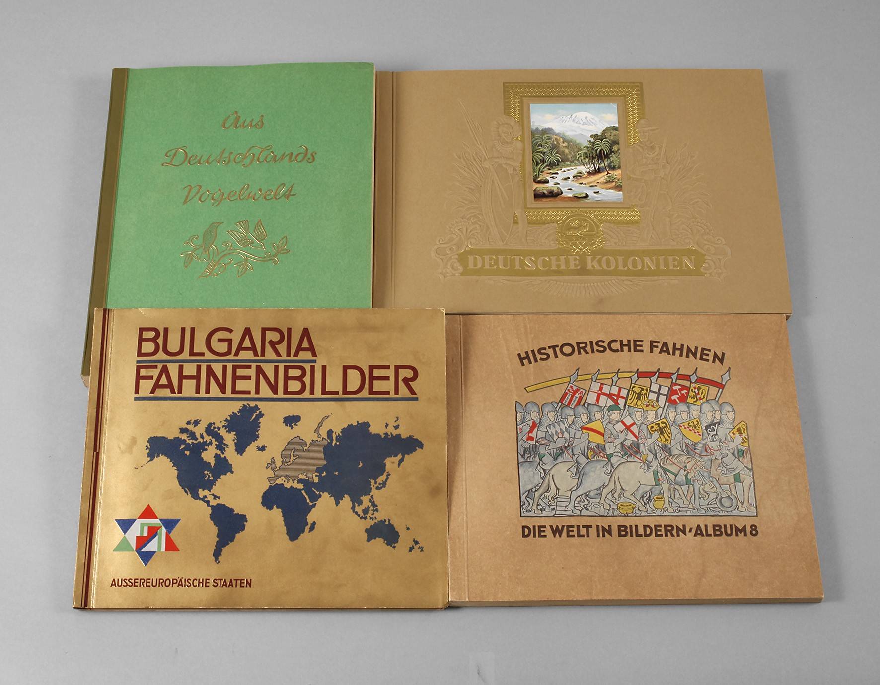Vier Sammelbilderalben