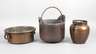 Drei Kupferkessel