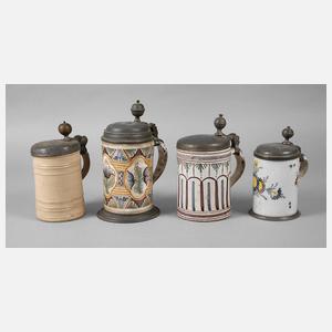 Drei Fayencekrüge und ein Steinzeugkrug