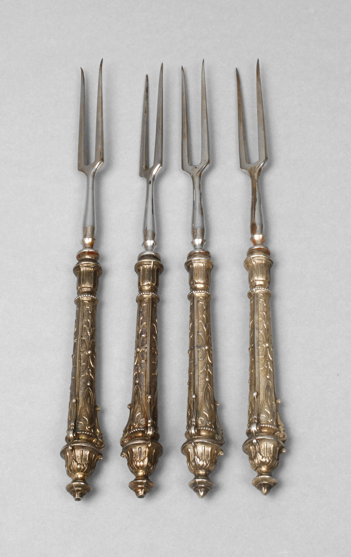 Vier Wurstgabeln Historismus