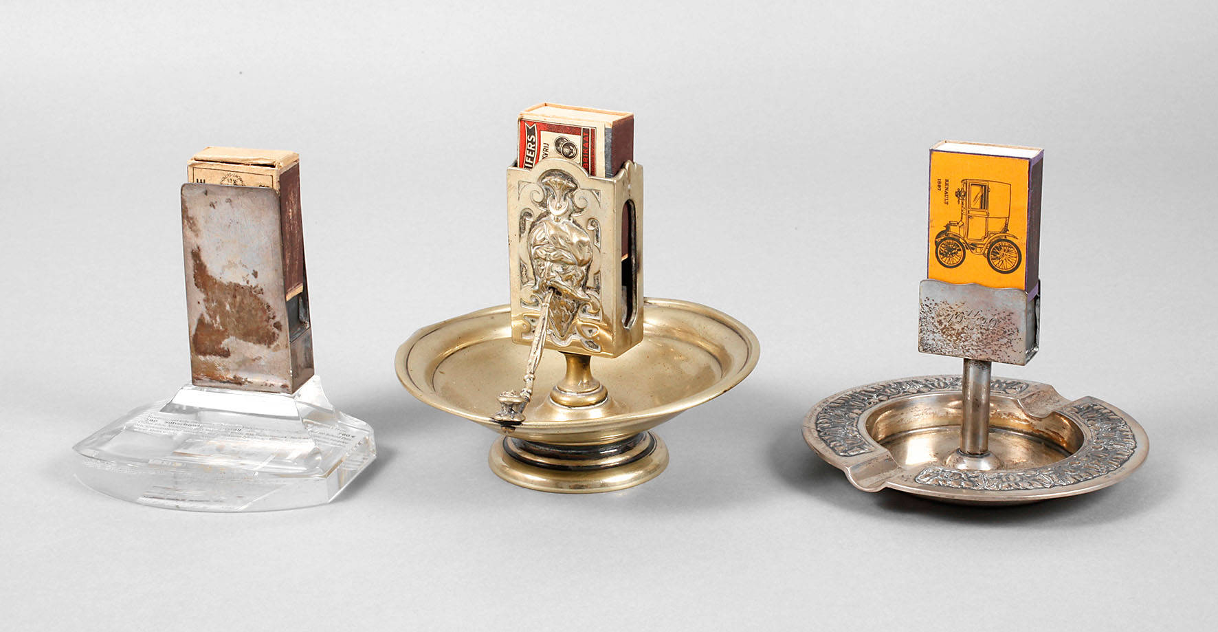 Drei Streichholzhalter