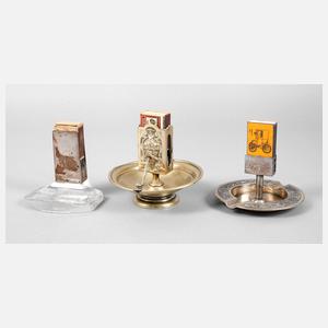 Drei Streichholzhalter