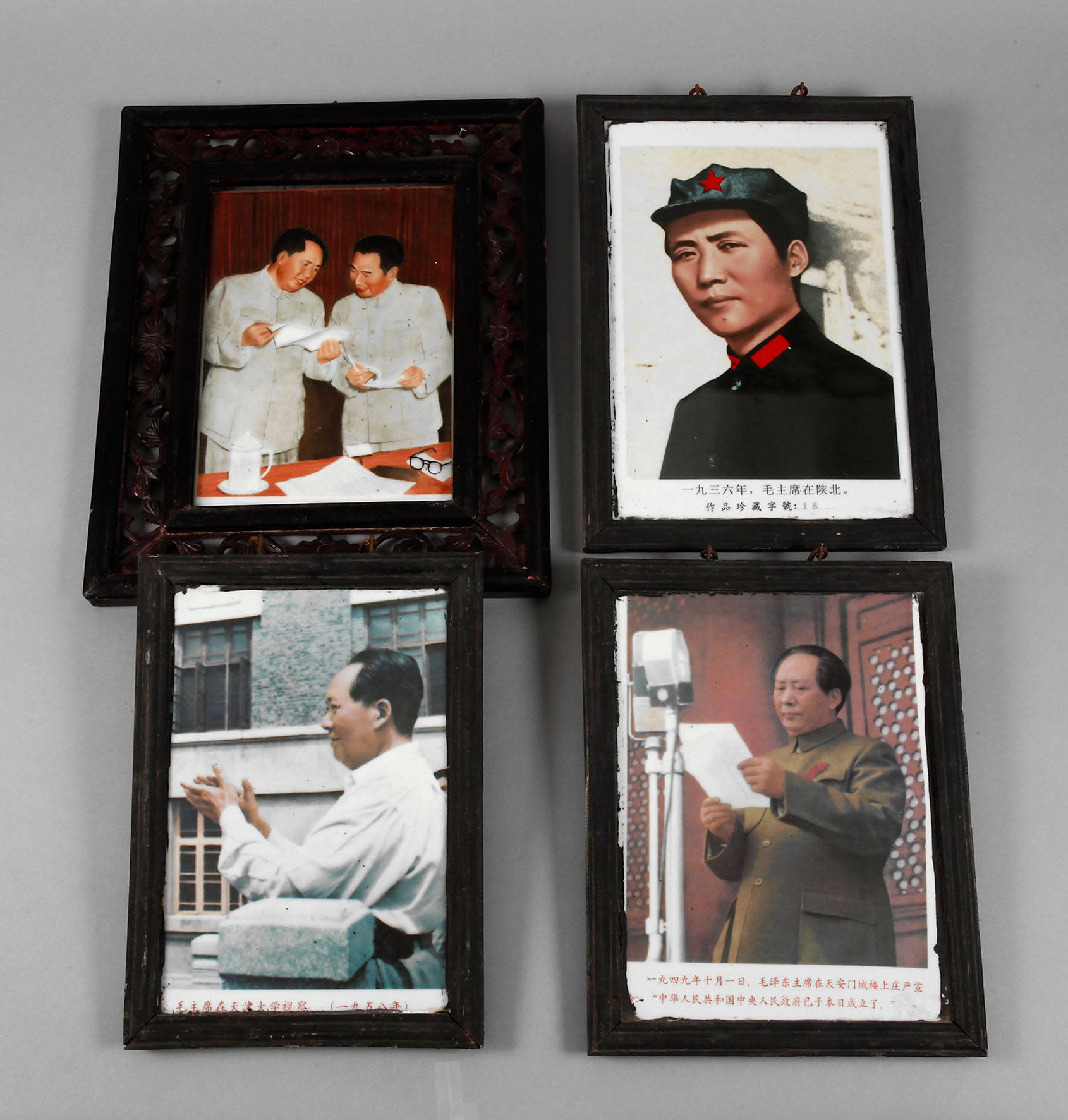 Vier Porzellanbildplatten