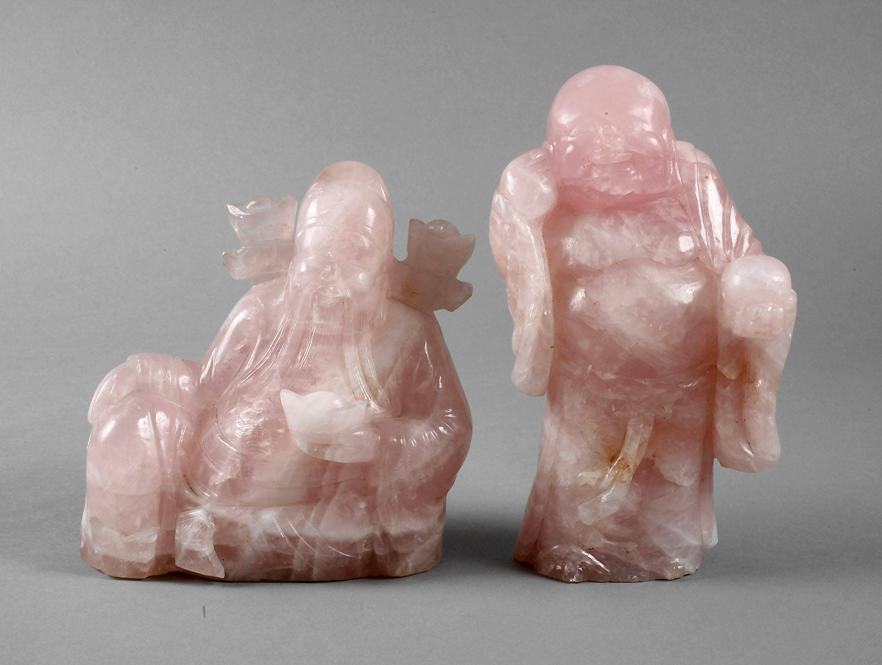 Paar figürliche Steinschnitzereien