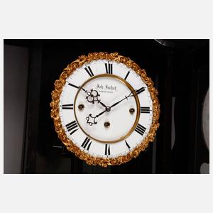 Wiener Gewichtsregulator, auf Ziffernblatt gemarkt Johann Imhoff Corneuburg, um 1860, großes, schwarz lackiertes Uhrengehäuse mit original Aufsatz, Ziffernblatt mit römischen Zahlen, eingefasst von floralem Ring aus vergoldeter Bronze, drei Gewichte,