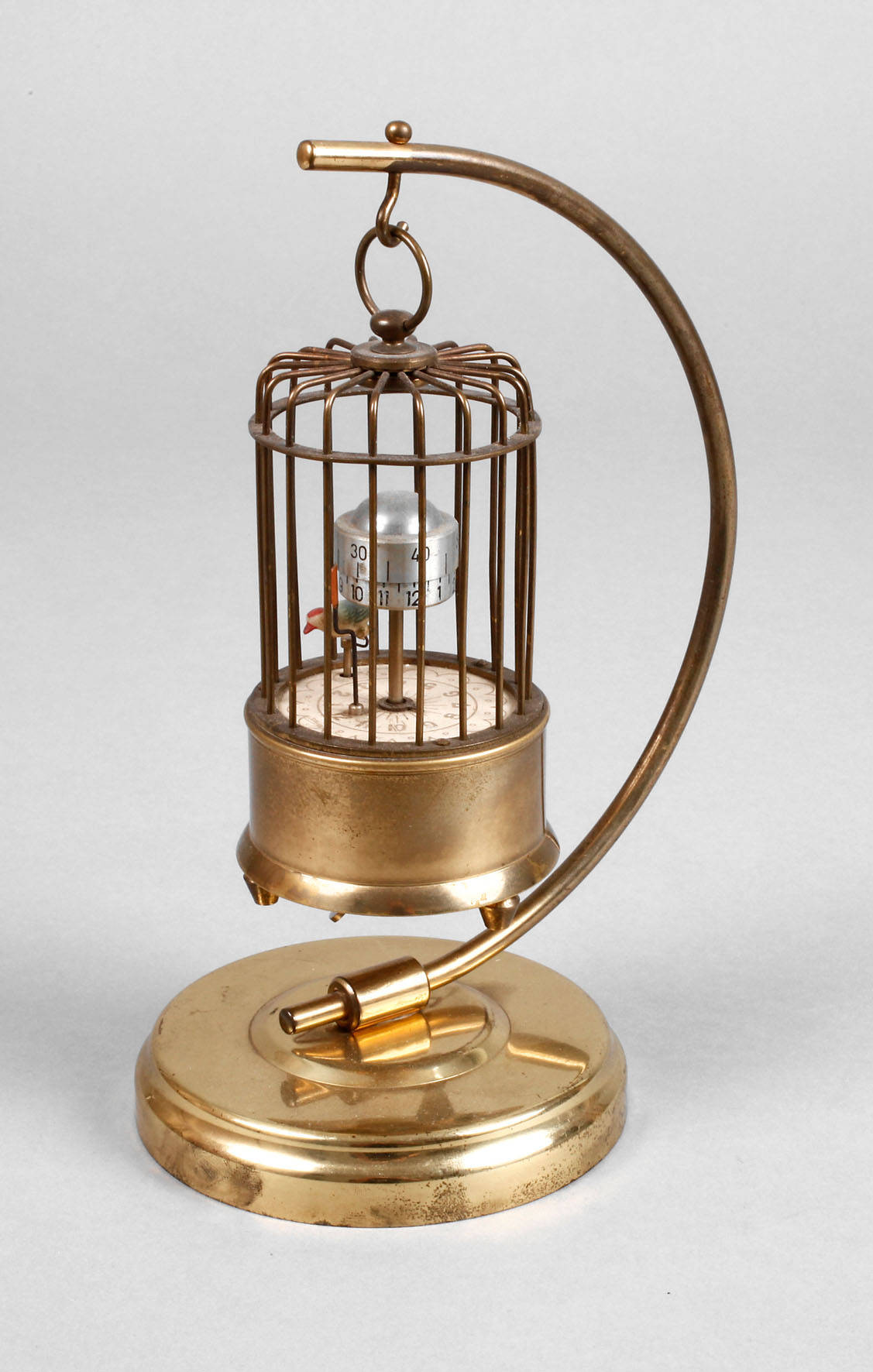 Wecker als Vogelkäfig