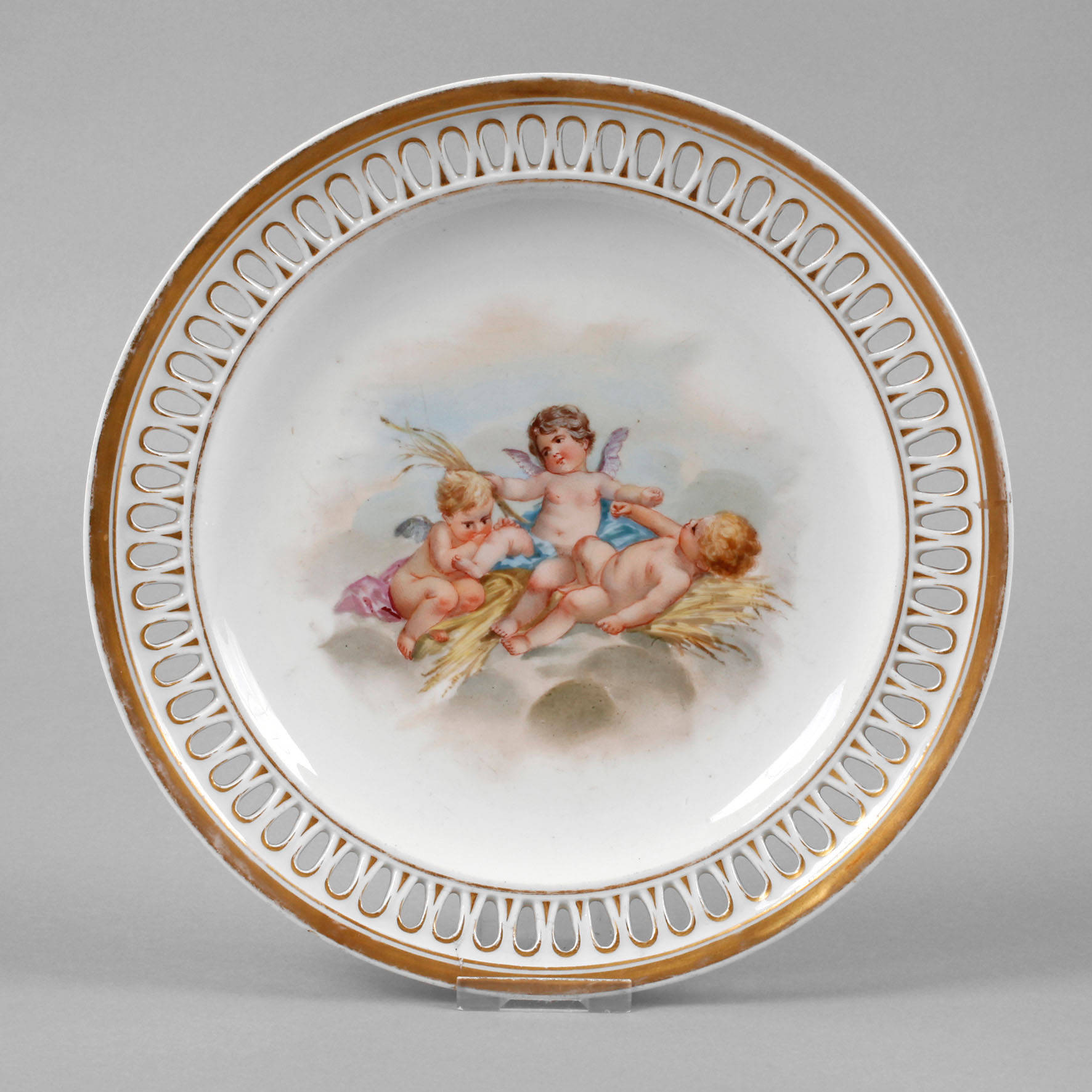 Meissen Durchbruchteller Puttenmotiv