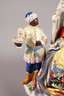 Meissen ”Reifrockdame mit Kavalier und Mohr”