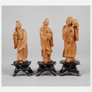 Drei figürliche Schnitzereien