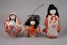 Sechs japanische Puppen