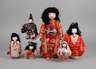 Sechs japanische Puppen