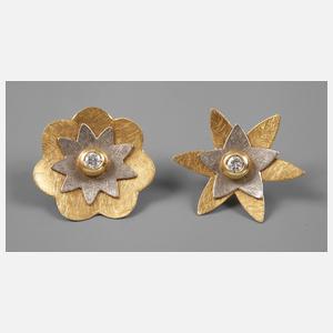 Ein Paar Verwandlungsohrringe mit Brillanten