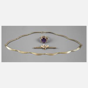 Drei Teile Goldschmuck