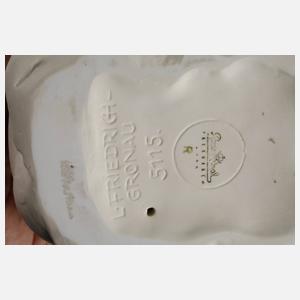 Rosenthal sitzender weiblicher Akt