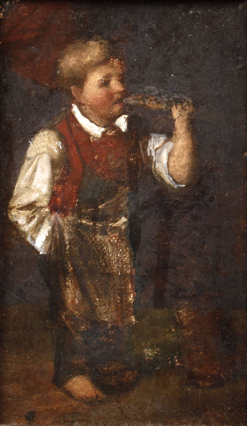 Knabe bei der Brotzeit