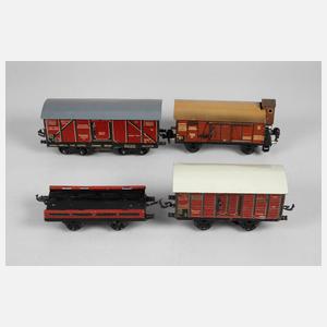 Vier Güterwagen Bing