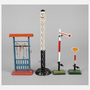 Vier Teile Eisenbahnzubehör