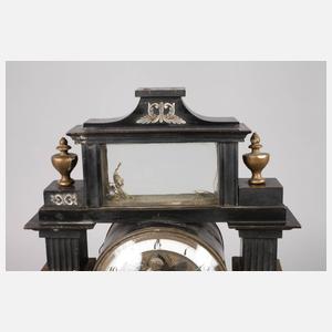 Säulenuhr mit Automat