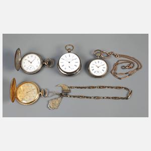 Vier Taschenuhren